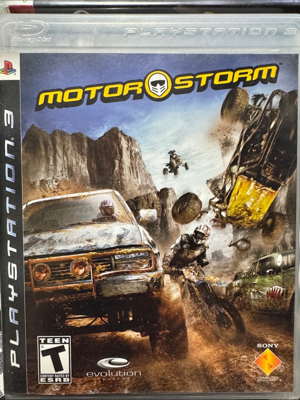 Sony MotorStorm PlayStation 3 Game - Yellow, Blue, Brown Cover Art